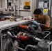 Sailor conducts routine maintenance aboard Abraham Lincoln