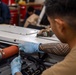 Sailor conducts routine maintenance aboard Abraham Lincoln