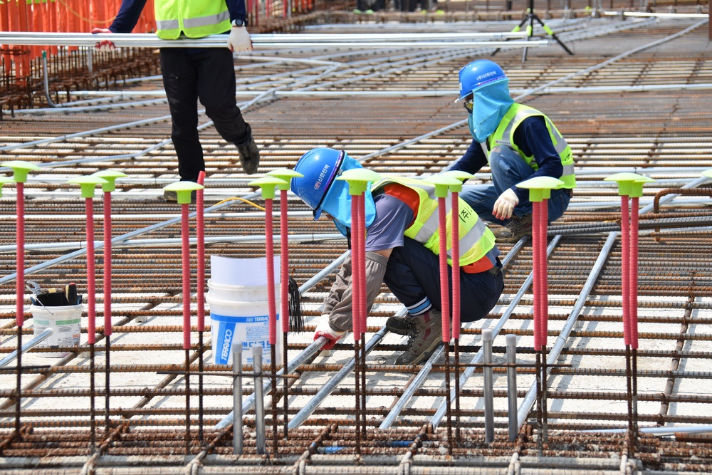 Army engineers pour concrete slab for third elementary school on Camp Humphreys, South Korea