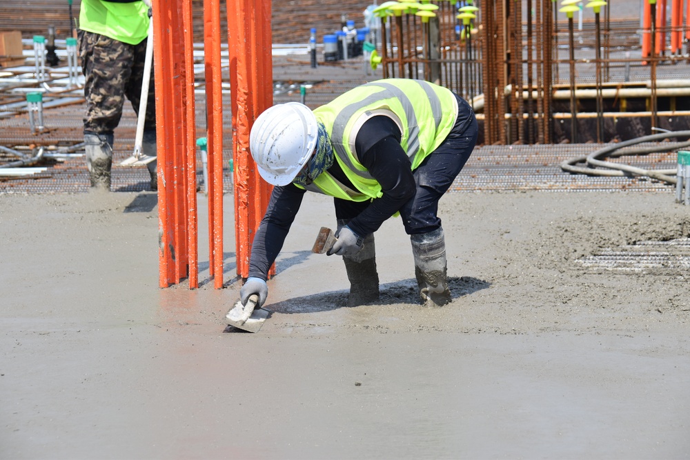 Army engineers pour concrete slab for third elementary school on Camp Humphreys, South Korea