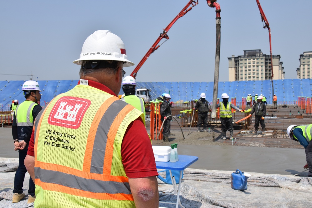 Army engineers pour concrete slab for third elementary school on Camp Humphreys, South Korea