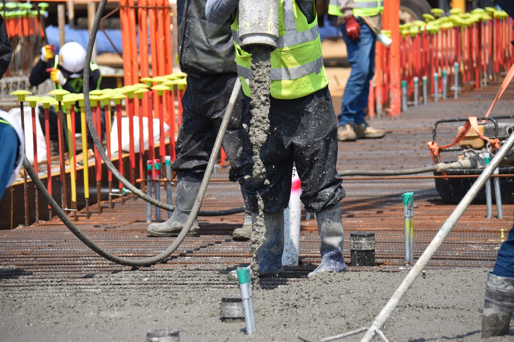 Army engineers pour concrete slab for third elementary school on Camp Humphreys, South Korea