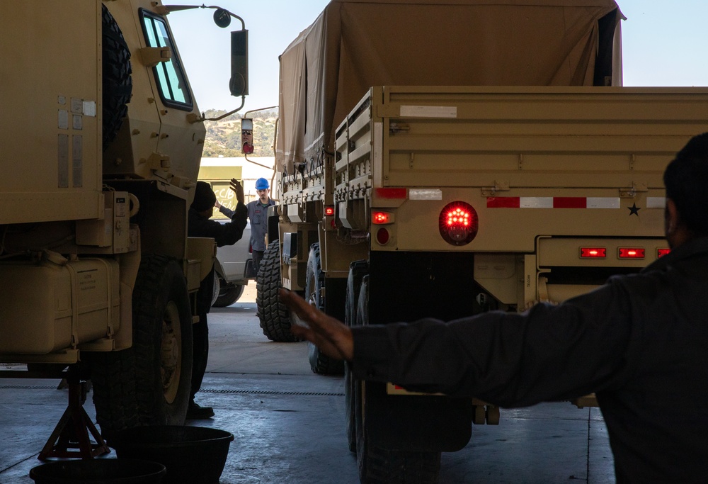 Miltechs with the 63rd help out