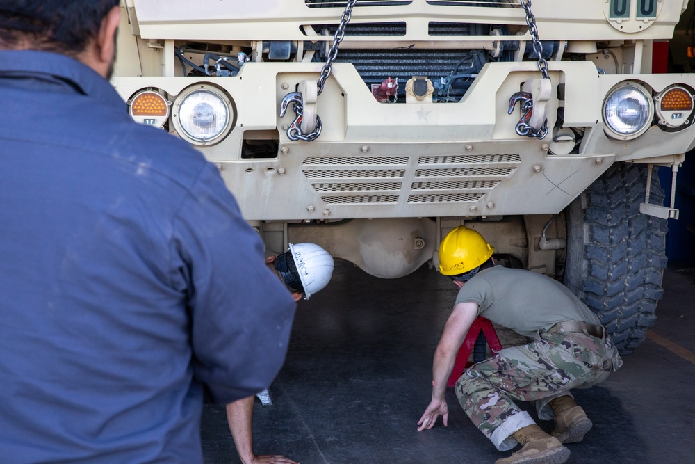 Miltechs with the 63rd help out
