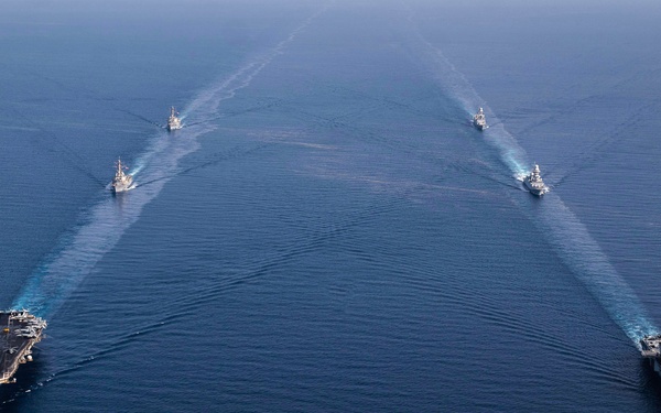 USS Dwight D. Eisenhower Carrier Strike Group Conducts Photoex with ITS Cavour Carrier Strike Group in the Red Sea