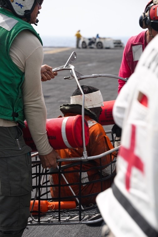 Headline: USS Dwight D. Eisenhower (CVN 69) Conducts Rescue Operations in the Red Sea