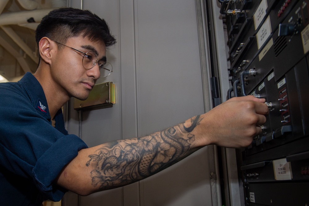 USS Ronald Reagan (CVN 76) Sailors troubleshoot communications tower
