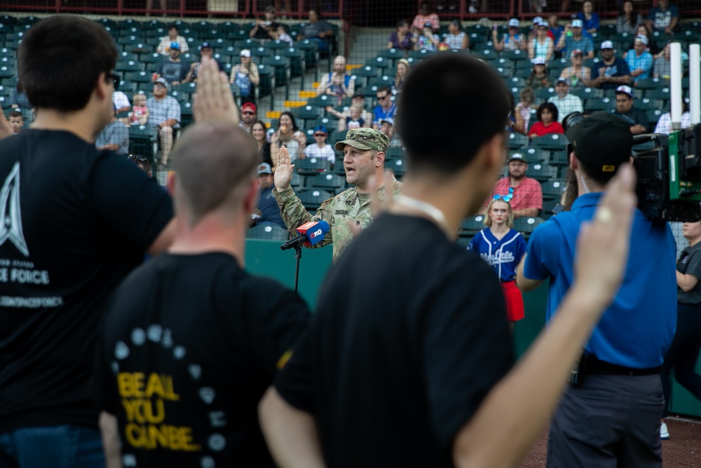 Battalion commander administers oath of enlistment at OKC baseball game