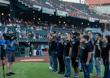 Battalion commander administers oath of enlistment at OKC baseball game