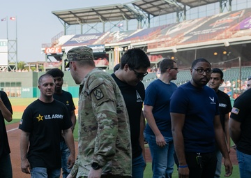 Battalion commander administers oath of enlistment at OKC baseball game
