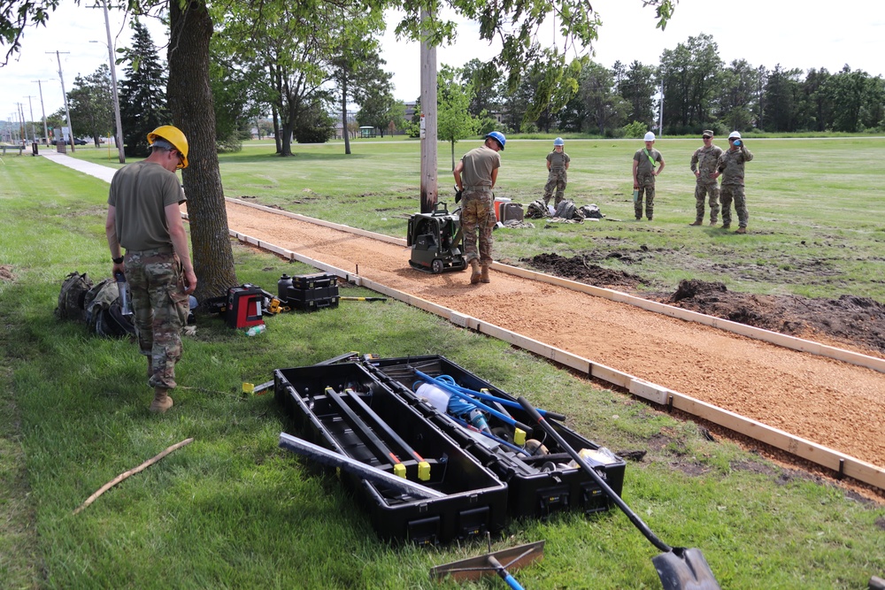 Wisconsin National Guard’s 824th Engineers complete sidewalk troop project during 2024 Fort McCoy training