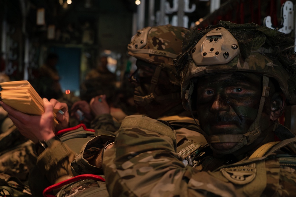 Paratroopers gear up for a RED FLAG-Alaska 24-2 static-line jump