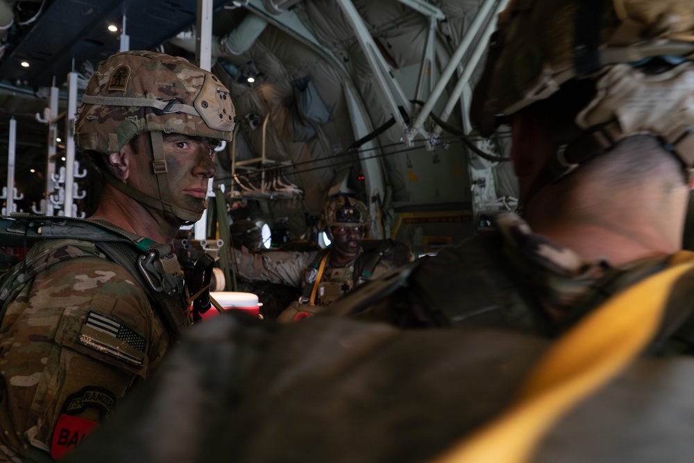 Paratroopers gear up for a RED FLAG-Alaska 24-2 static-line jump