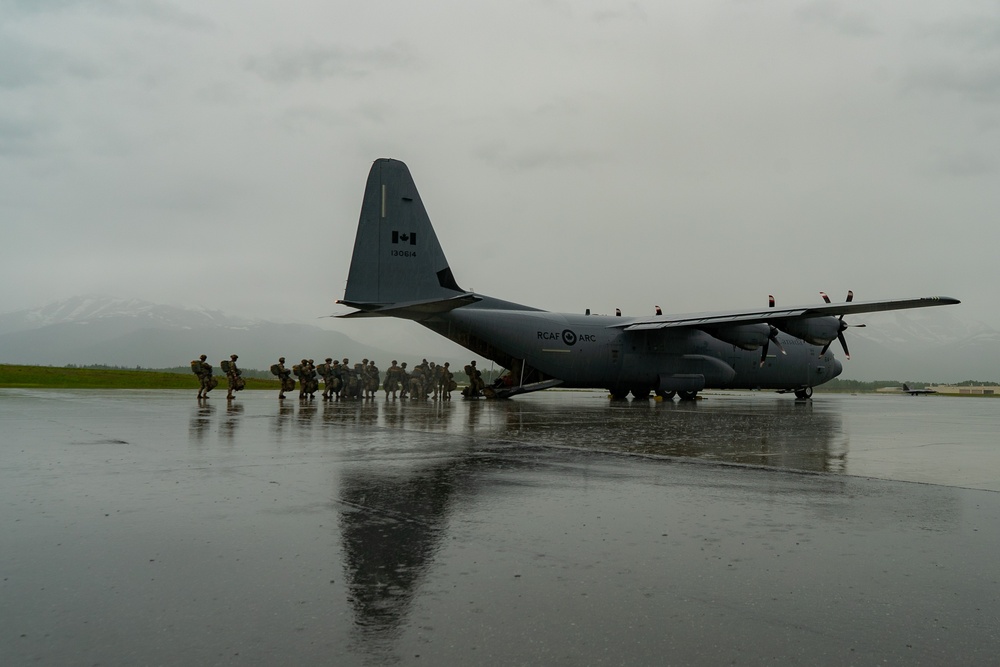 Paratroopers gear up for a RED FLAG-Alaska 24-2 static-line jump