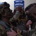 Paratroopers gear up for a RED FLAG-Alaska 24-2 static-line jump