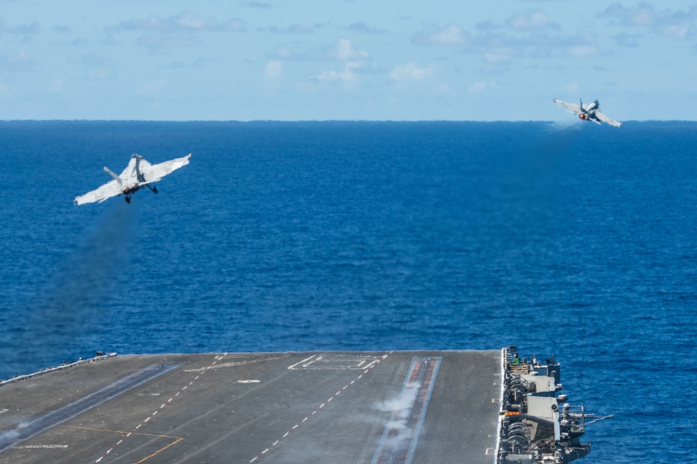 USS Ronald Reagan (CVN 76) Sailors stand watch in the pilot house during flight operations in support of Valiant Shield 2024
