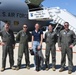 KCAU reporter poses with 185th ARW aircrew