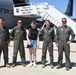 Sioux City Journal reporter poses with 185th ARW aircrew