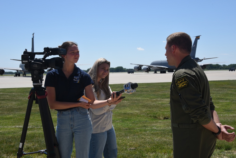 Local news reporters interview 185th ARW Tech. Sgt. Tyler Schiefen