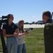 Local news reporters interview 185th ARW Tech. Sgt. Tyler Schiefen