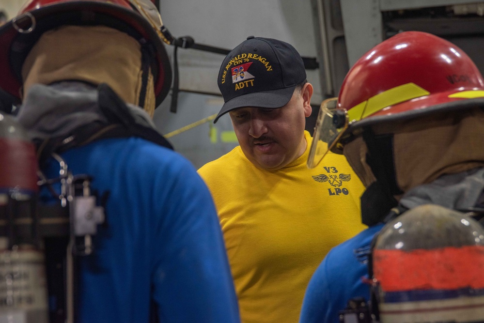 USS Ronald Reagan (CVN 7Sailors conduct  general quarters drill