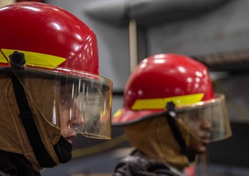 USS Ronald Reagan (CVN 7Sailors conduct  general quarters drill