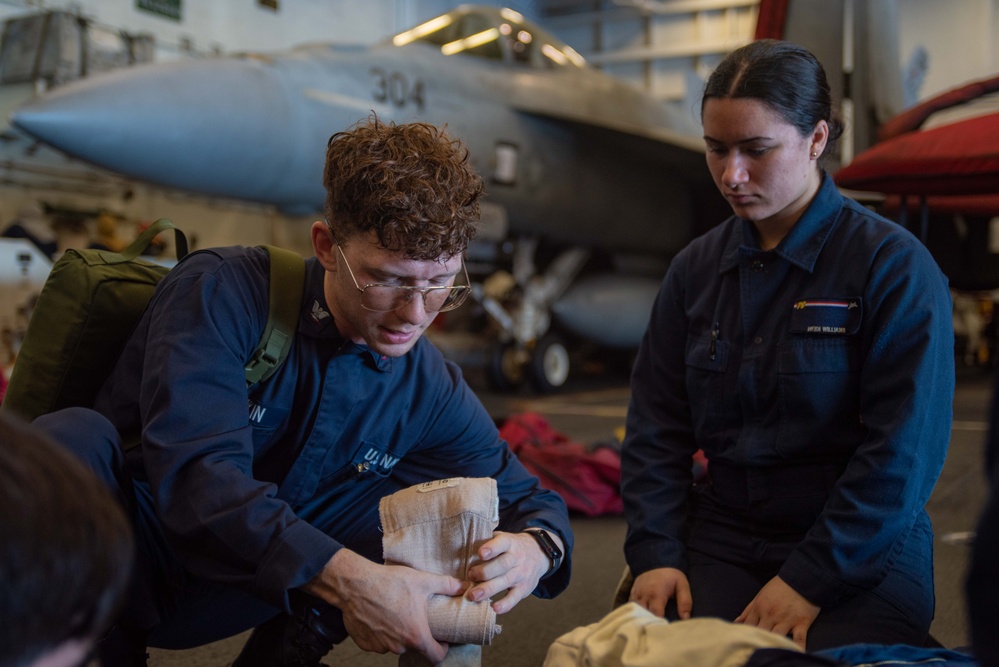 USS Ronald Reagan (CVN 7Sailors conduct  general quarters drill