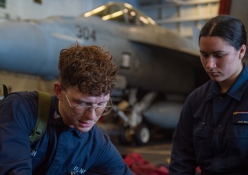 USS Ronald Reagan (CVN 7Sailors conduct  general quarters drill