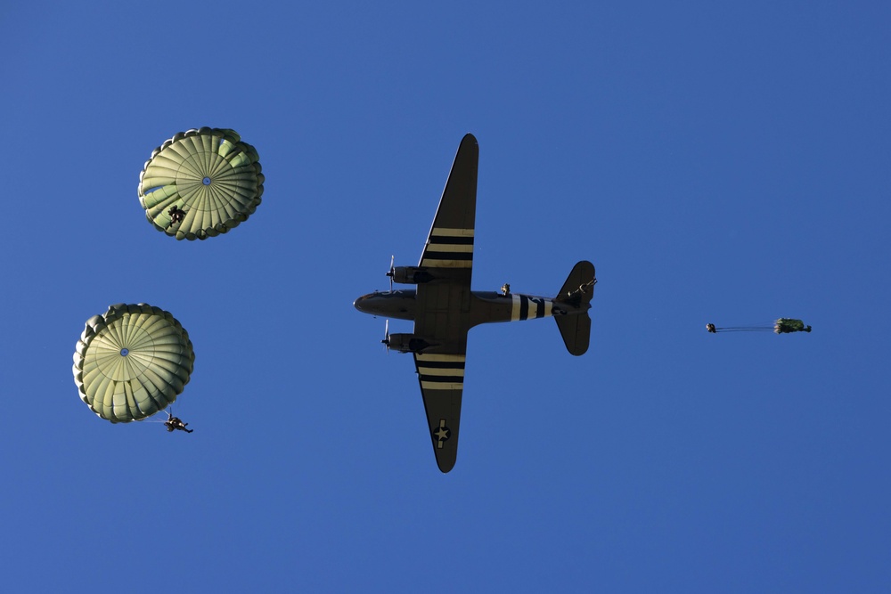 Multi-national paratroopers commemorate D-Day with historic jump into Normandy, France.