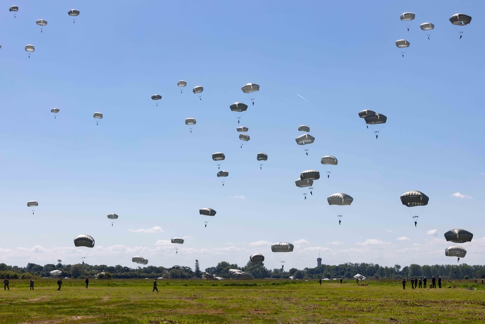 Multi-national paratroopers commemorate D-Day with historic jump into Normandy, France.