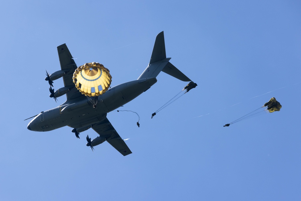 Multi-national paratroopers commemorate D-Day with historic jump into Normandy, France.