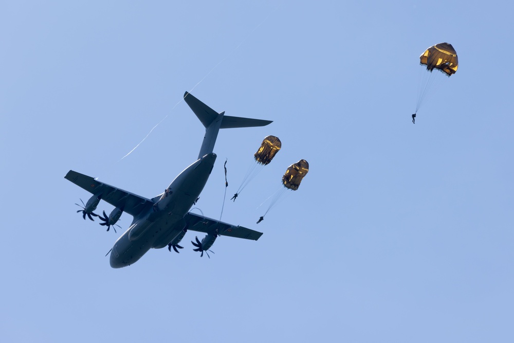 Multi-national paratroopers commemorate D-Day with historic jump into Normandy, France.