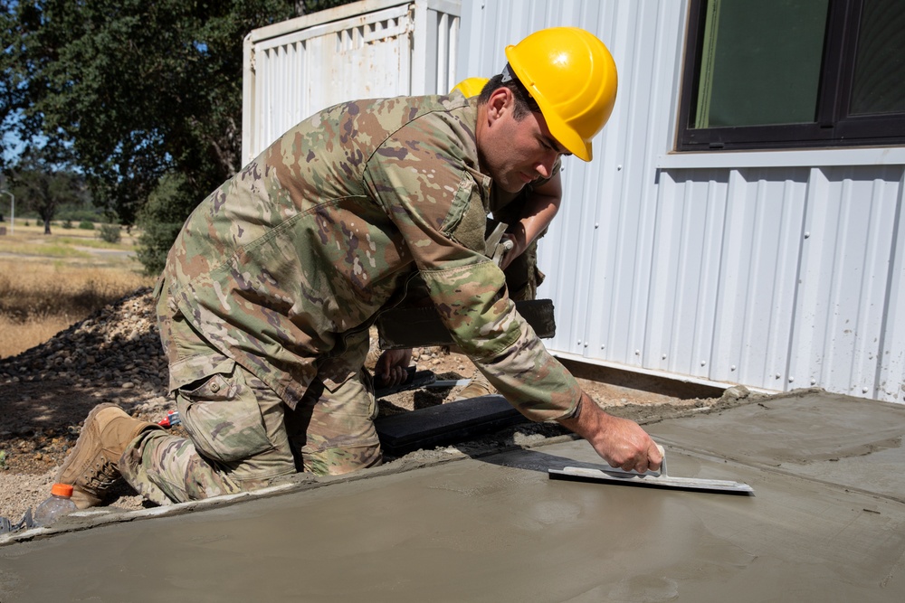 Engineer Soldiers Build Concrete Paths at Annual Training