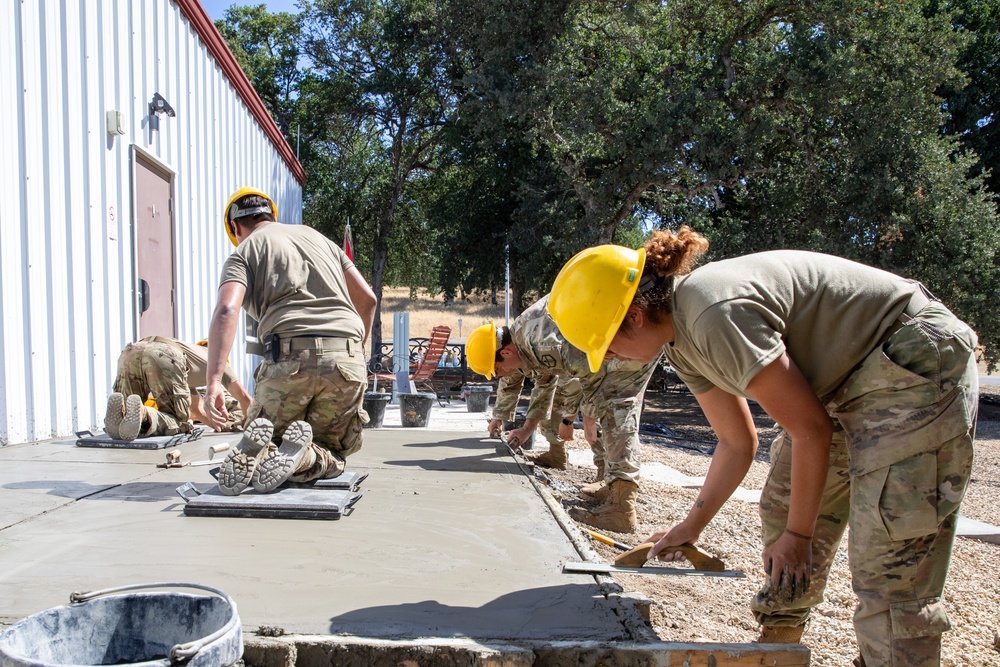 Engineer Soldiers Build Concrete Paths at Annual Training