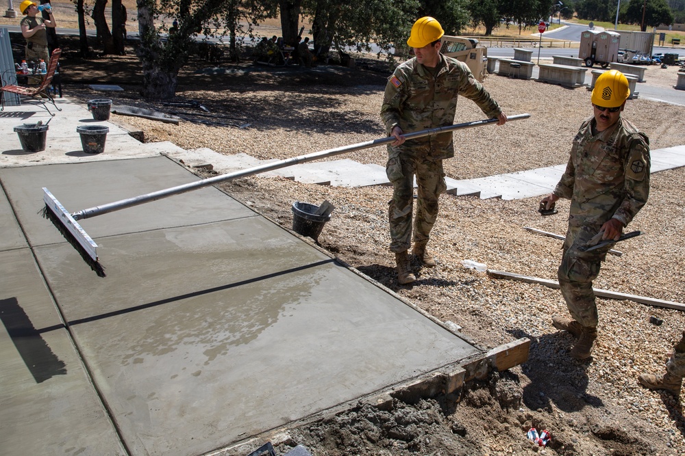 Engineer Soldiers Build Concrete Paths at Annual Training