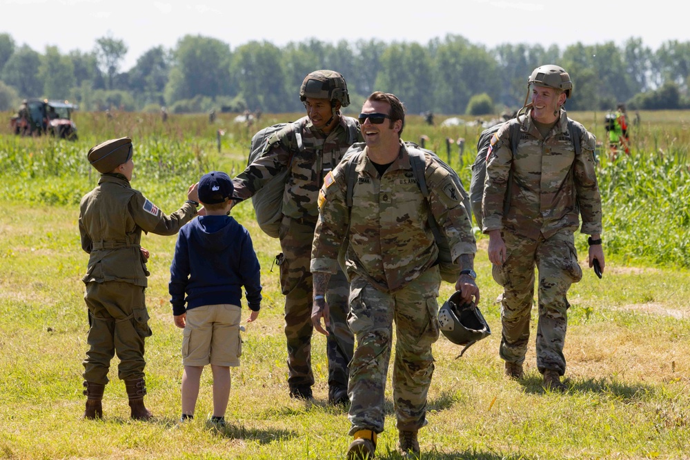 Multi-national paratroopers commemorate D-Day with historic jump into Normandy, France.