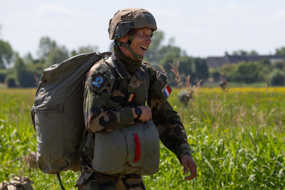 Multi-national paratroopers commemorate D-Day with historic jump into Normandy, France.