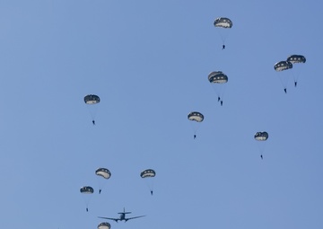 Multi-national paratroopers commemorate D-Day with historic jump into Normandy, France.