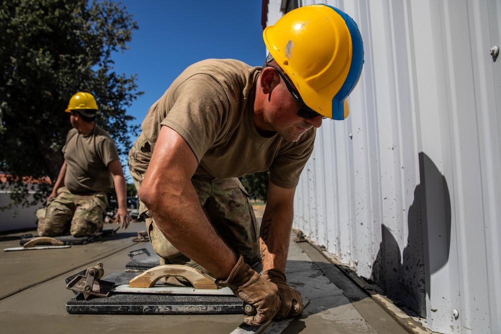 Engineer Soldiers Build Concrete Paths at Annual Training