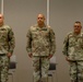 CSM Natal receives the ceremonial blade from LTC Rodriguez and CSM Gonzalez, signifying his new role as the Command Sergeant Major of the Caribbean Readiness Group during the Change of Responsibility Ceremony at Fort Buchanan, Puerto Rico.