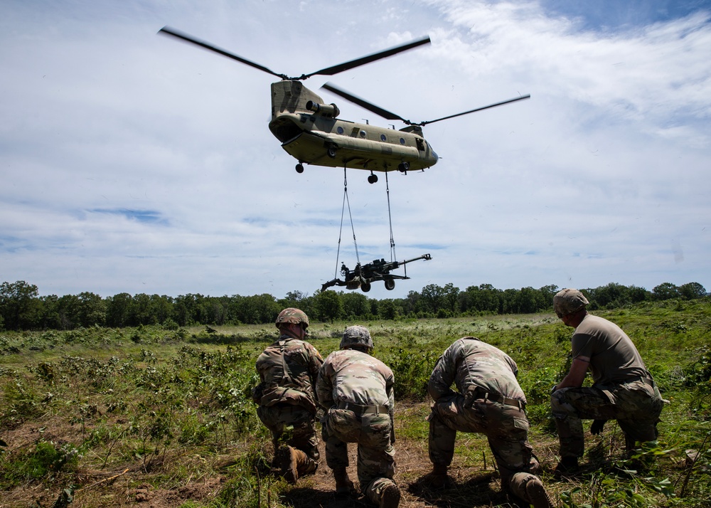 Soldiers Take A Knee To Watch Chinook Depart After Sling Load