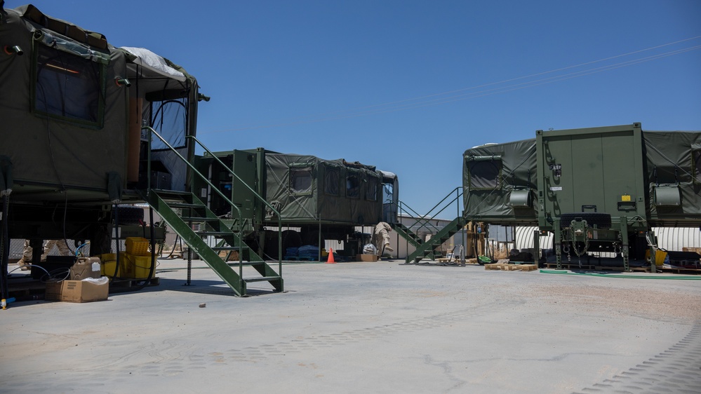 U.S. Marine food service specialists prepare evening chow at Integrated Training Exercise 4-24