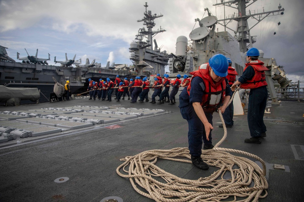 USS Ralph Johnson Conducts Replenishment-at-Sea with USS Theodore Roosevelt