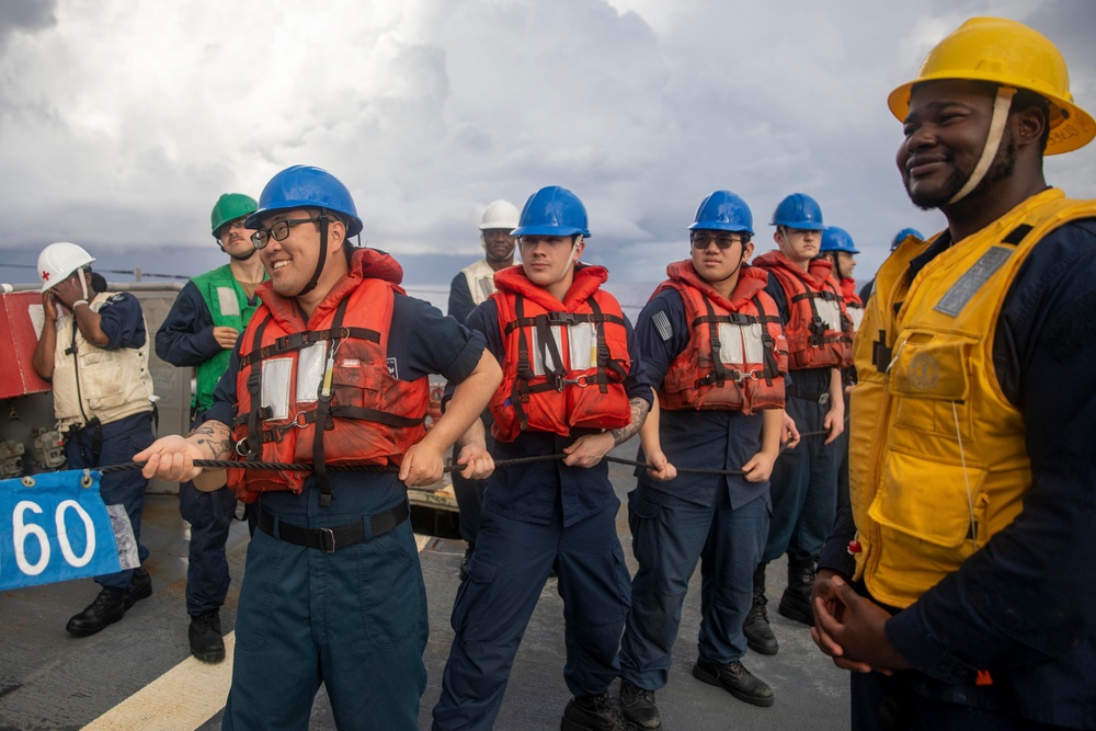 USS Ralph Johnson Conducts Replenishment-at-Sea with USS Theodore Roosevelt