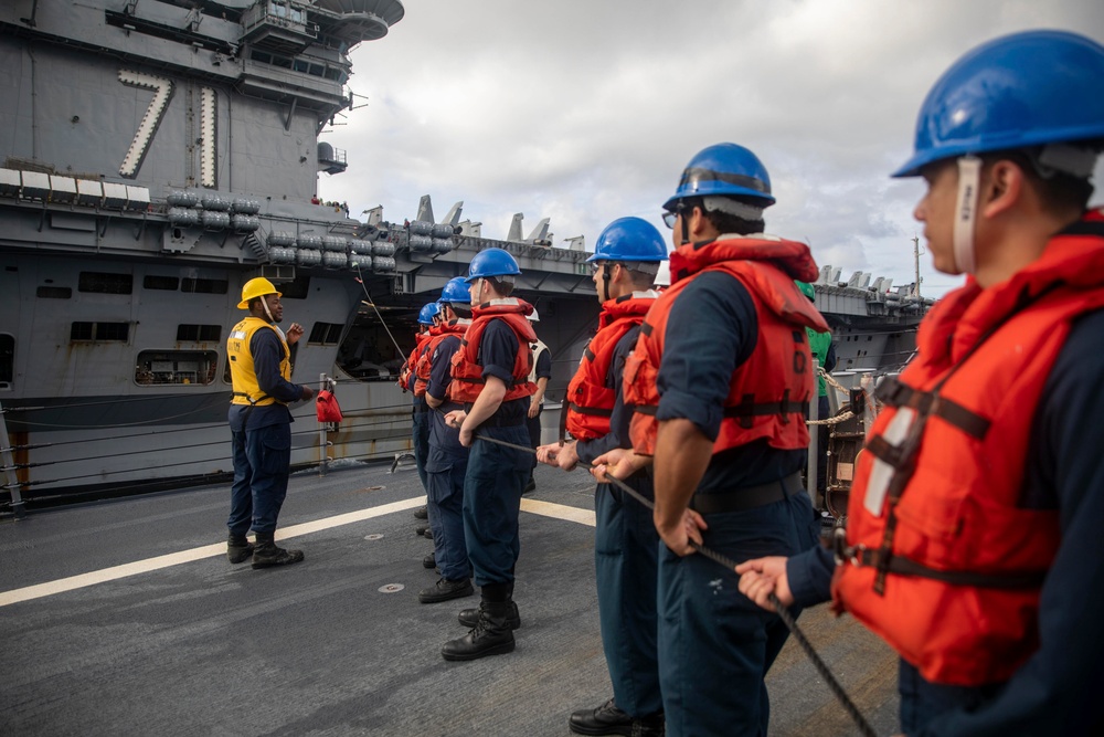 USS Ralph Johnson Conducts Replenishment-at-Sea with USS Theodore Roosevelt