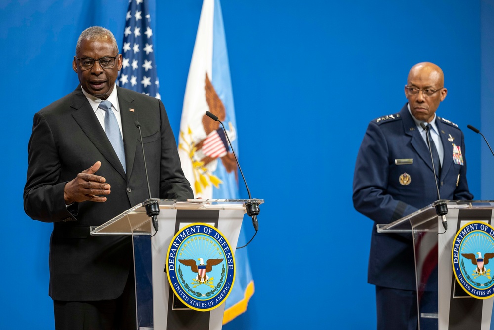 Defence officials reviewing documentation at NATO Headquarters during the Ukraine Defense Contact Group