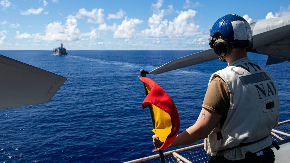 USS Ronald Reagan (CVN 76) conducts a fueling-at-sea and replenishment-at-sea with USNS Rappahannock (T-AO 204) and  USNS Charles Drew (T-AKE-10)