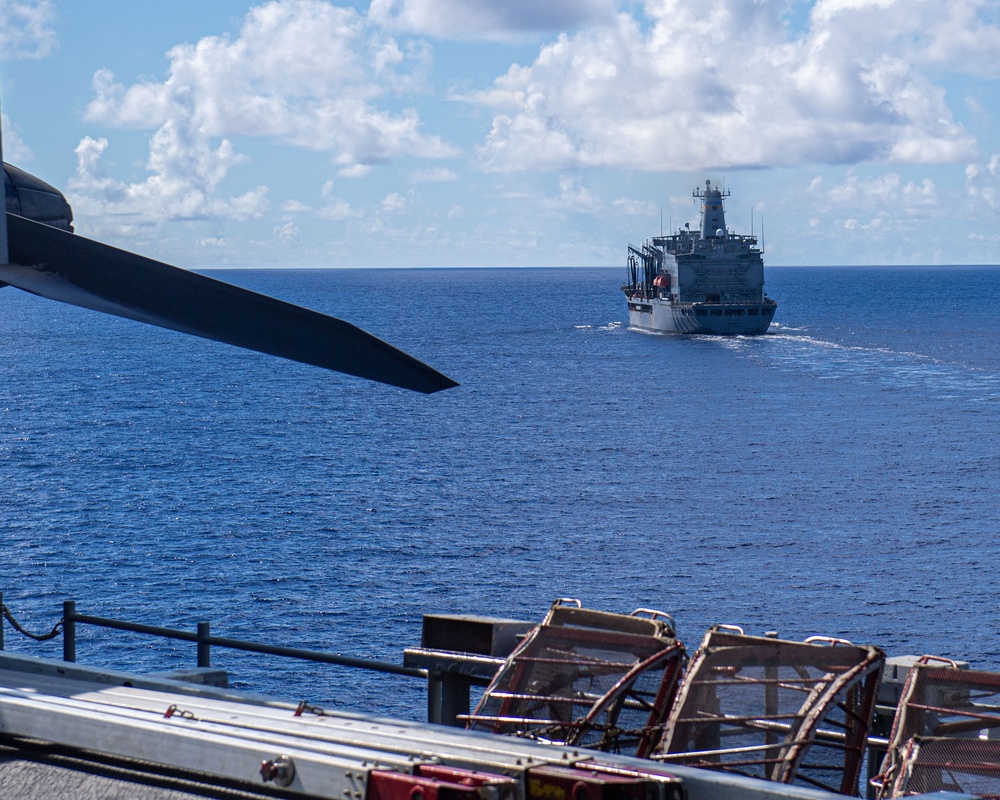 USS Ronald Reagan (CVN 76) conducts a fueling-at-sea and replenishment-at-sea with USNS Rappahannock (T-AO 204) and  USNS Charles Drew (T-AKE-10)