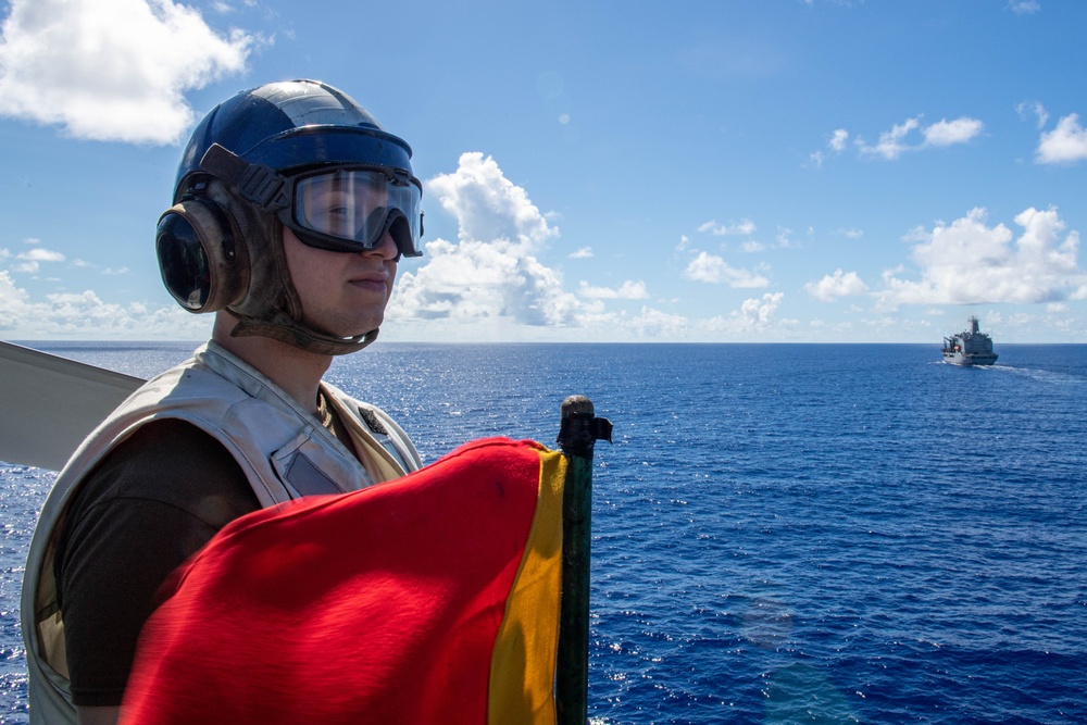 USS Ronald Reagan (CVN 76) conducts a fueling-at-sea and replenishment-at-sea with USNS Rappahannock (T-AO 204) and  USNS Charles Drew (T-AKE-10)