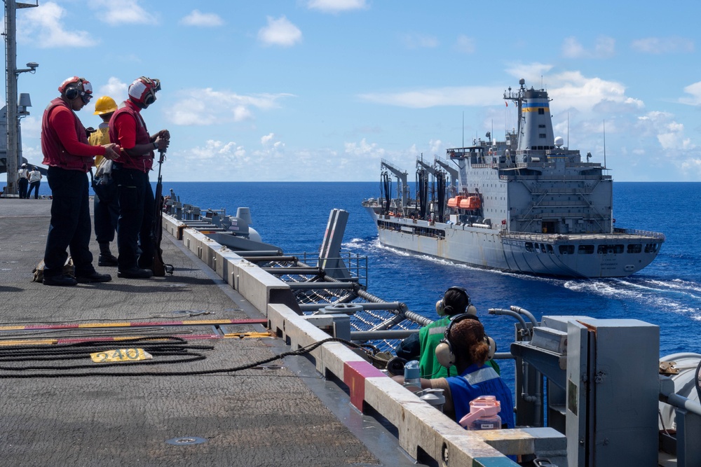 USS Ronald Reagan (CVN 76) conducts a fueling-at-sea and replenishment-at-sea with USNS Rappahannock (T-AO 204) and  USNS Charles Drew (T-AKE-10)